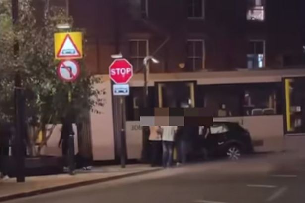 A car crashed into a tram at Oldham Mumps
