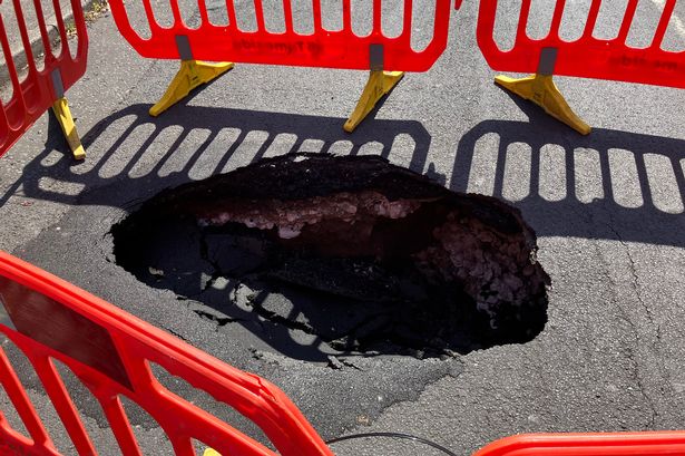 A sinkhole has opened up on Taunton Road, Ashton