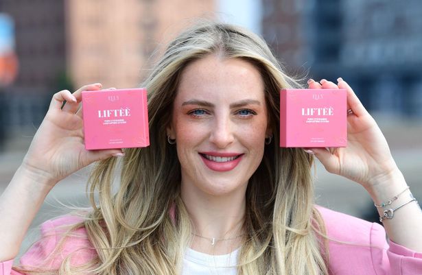 Elly holding her product, Liftee