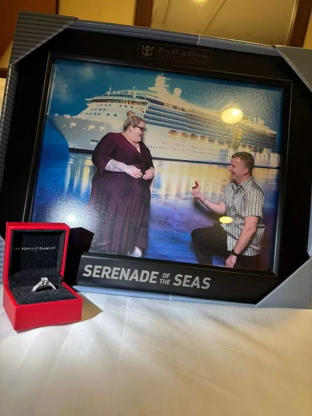 Picture of man proposing to woman on a cruise