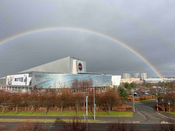 XSite pictured with rainbow above