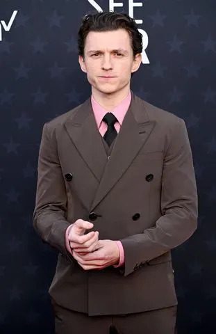 Lionel Hahn/Getty Tom Holland in 2024