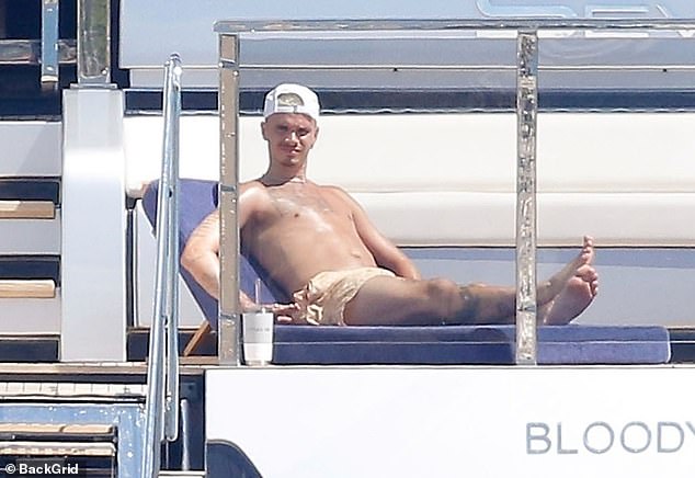 Romeo has been enjoying some time in the sun with his family following his split from his girlfriend Kim Turnbull