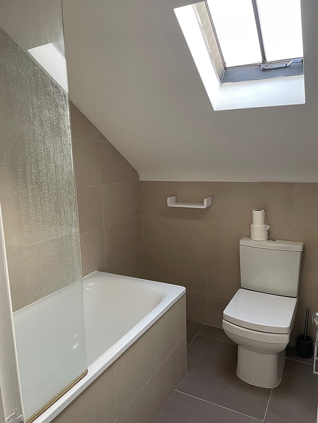 The un-staged bathroom looked uninviting and appeared plain