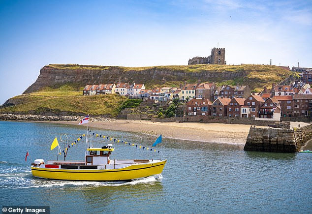 Whitby remains a discreet, beautiful harbour town in the shadow of its famous ruined abbey, writes Roger