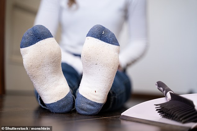 Our warm, humid feet are the perfect environment to incubate the bacteria and fungi that our socks pick up. These microbes won't be killed by a hot wash, so ironing is key to ensure your socks are really clean (stock image)