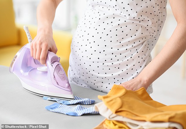 A microbiologist has revealed the proper way to wash your socks, and why it is important that you iron them (stock image)