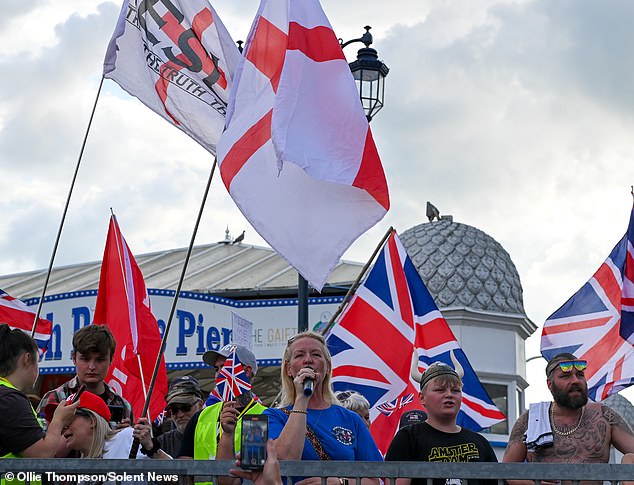 SOUTHSEA: Anti-migrant demonstrators face off against protesters from Stand Up to Racism outside the Royal Beach Hotel in Southsea, Hants, this evening, Friday 1st August 2025.