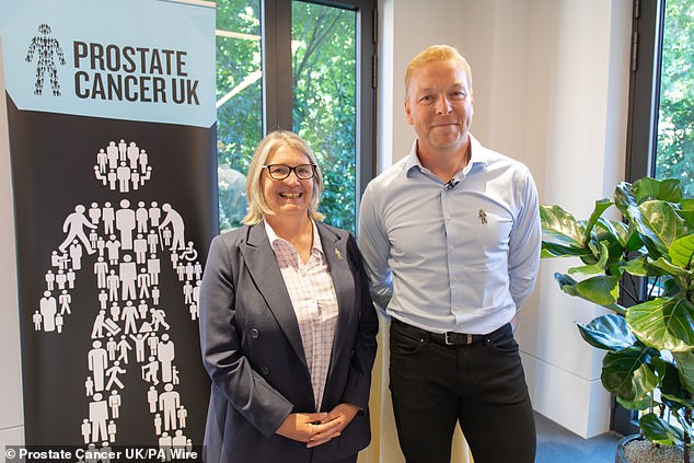 Hoy pictured earlier this year at an event alongside Prostate Cancer UK's CEO Laura Kerby