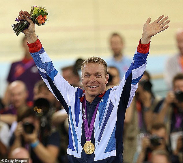 Hoy celebrates with his gold medal after the final of the men's Keirin at the 2012 Olympics