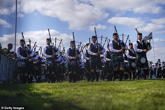 The monarch was entertained with a performance by a pipe band at the Mey Highland Games
