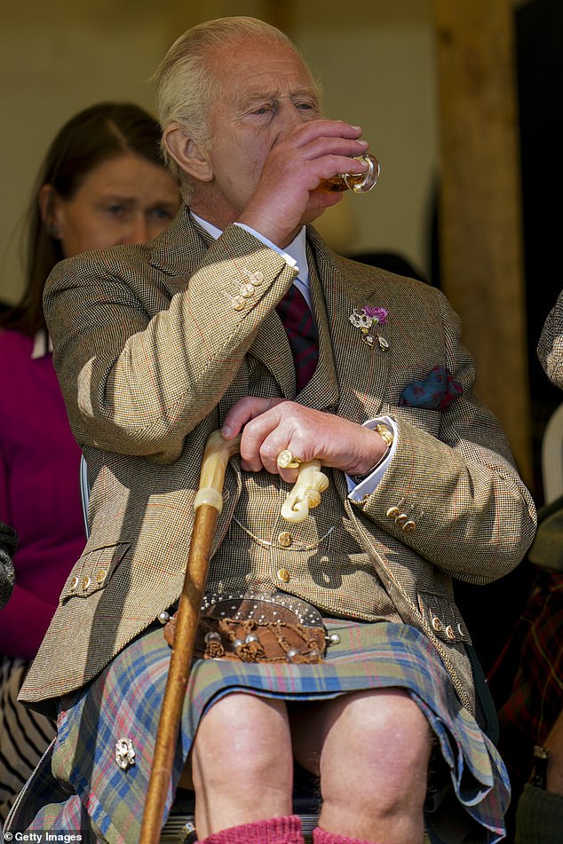 At one point the King was seen enjoying a cheeky dram of whisky as he watched the events