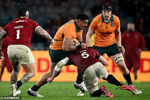 The tourists copped another blow when James Ryan (pictured wearing No.5) copped a serious head knock as he attempted to tackle Wallabies star Will Skelton