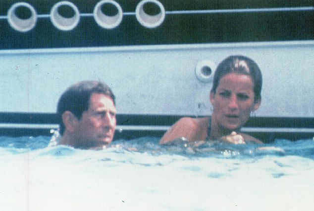 Charles and Diana swimming in the sea off the coast of Sardinia. From what is known now their marriage was very much on the rocks by the summer of 1991