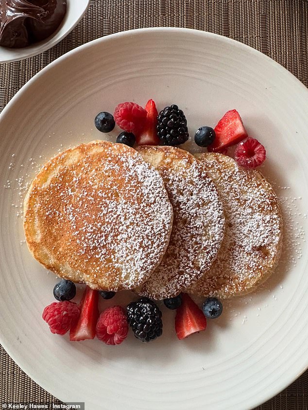 Keeley also snapped a picture of the pool and a plate of pancakes and fruit that she had tucked into for breakfast