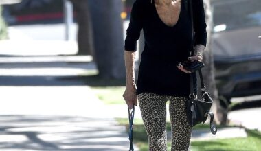 This iconic glamor girl from the '60s and '70s was spotted looking as fashionable as ever while taking her adorable pooches for a walk in Los Angeles last week