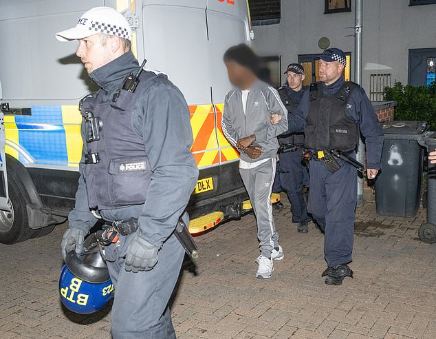 Officers smashed the door of a townhouse in Dagenham where a 16-year-old lived with his mother and sister
