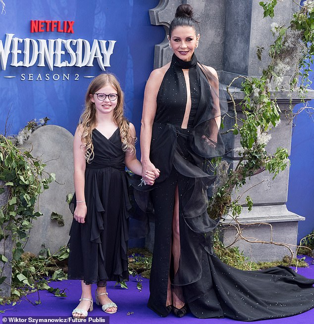 Catherine Zeta-Jones has been stunning in hyper glamorous outfits while promoting her new season of her smash-hit series Wednesday around the world this summer