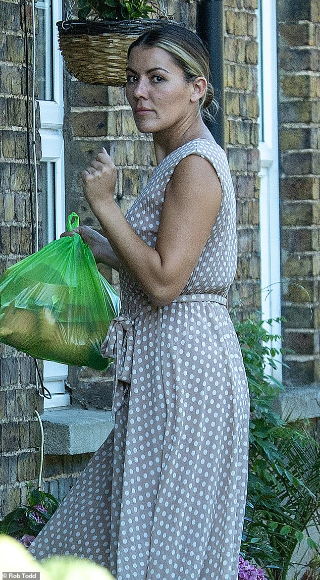 Back in Britain: Jasmine Wyld at home on Friday after returning from the family holiday that ended in her father-in-law's arrest