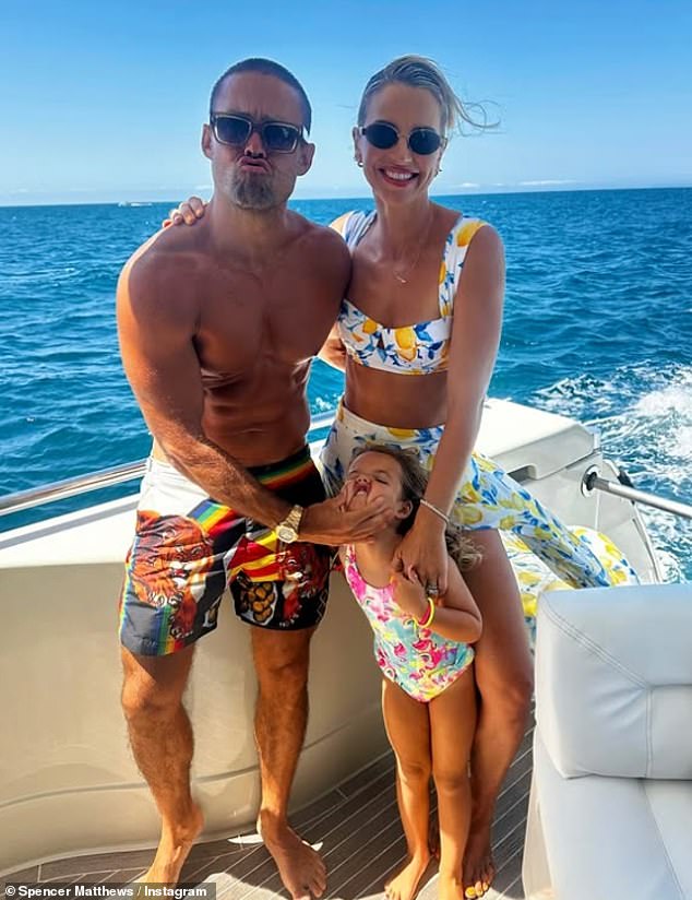 Vogue and the former Made In Chelsea star, 37, looked loved-up as they posed on the back of the boat with daughter Gigi, four