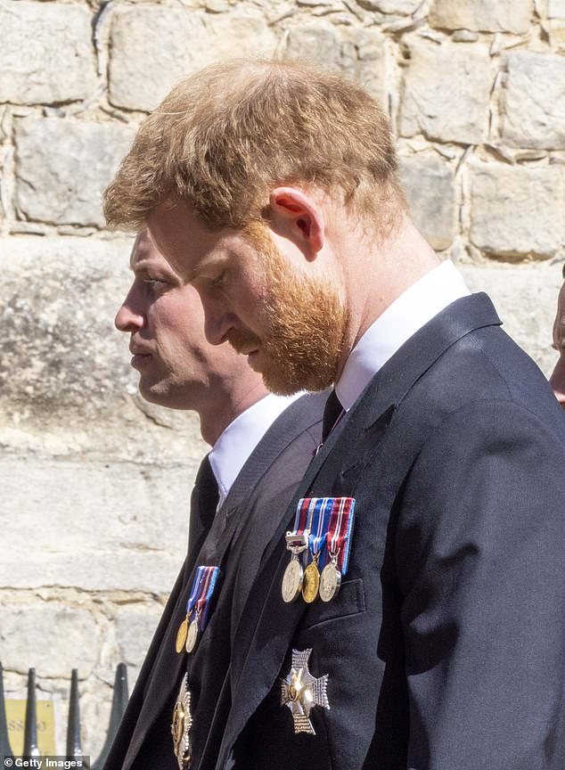 William and Harry are pictured taking part in the Ceremonial Procession during the funeral of Prince Philip, Duke of Edinburgh, at Windsor Castle on April 17, 2021