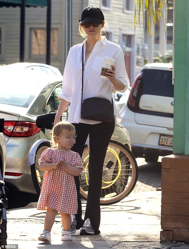 But in a new interview with Vogue , she offered a rare, heartfelt glimpse into motherhood, complete with pumpkin oatmeal desserts and cartoon marathons; pictured in 2022