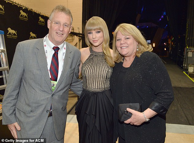 In 2020, Taylor said doctors had discovered that Andrea had developed a brain tumor; pictured with both parents in 2013