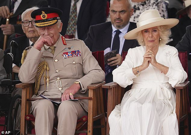 The King and Queen appeared visibly emotional after a veteran went 'off-script' to salute the monarch during the VJ Day service today