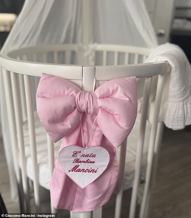 He shared shared a glimpse of his daughter's crib which featured a big pink bow