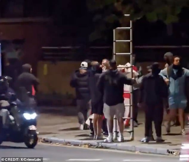 'Operation Raise the Colours' demonstrators began setting up St George's flags in Tower Hamlets last night