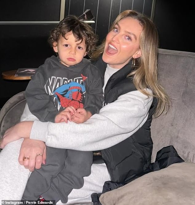 The Little Mix star gave birth to her first child with footballer Alex Oxlade-Chamberlain in 2021 (pictured with Axel earlier this year)