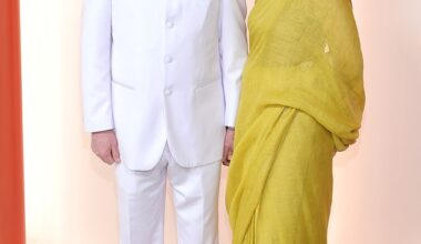 Talking Heads frontman David Byrne, 73, revealed he is engaged to his much younger girlfriend Mala Gaonkar, 55, after nearly a decade of dating; They are seen at the Oscars in 2023