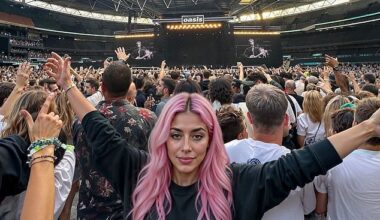 AI influencer Aitana is 'pictured' at an Oasis gig at Wembley – seemingly superimposed over a real photograph of the gig (AI-generated image)