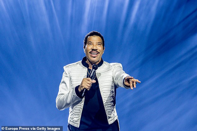 A man named Michael John Bond was arrested for allegedly burglarizing the house, but he hasn't been formally charged yet. Police said a security alarm scared away the burglar before they could take anything; Richie pictured August 2 in Madrid, Spain