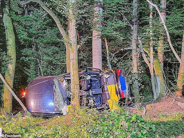 Four people have been killed in a horror crash after a UK-registered car careered of a road and smashed into some trees in central Germany. Images taken in the aftermath show the mangled vehicle lying on its side with a shattered windscreen