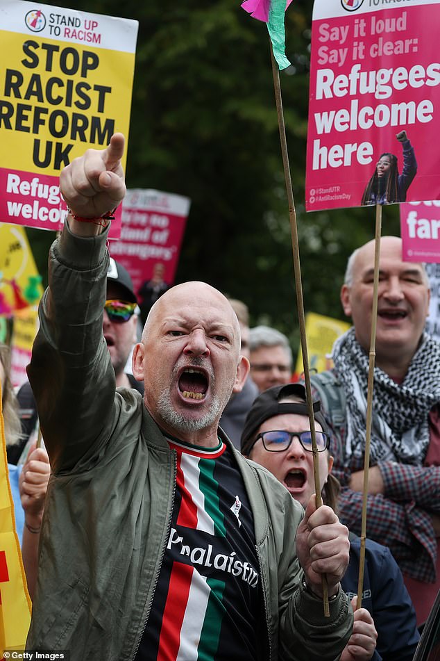 A man gesticulates while attending a counter-protest in Perth