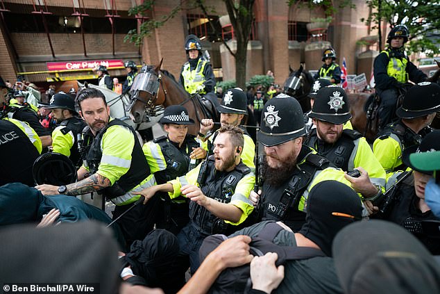 Later scuffles broke out between police and protesters and mounted police officers in full riot gear were deployed