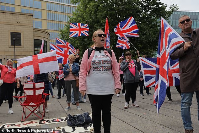 A anti-immigration protester wears a t-shirt reading 'keep Britain British' in Newcastle this afternoon
