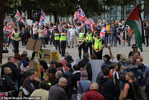 A far right group campaigning against migrants in the New Bridge Hotel stand off against a counter group defending the refugees