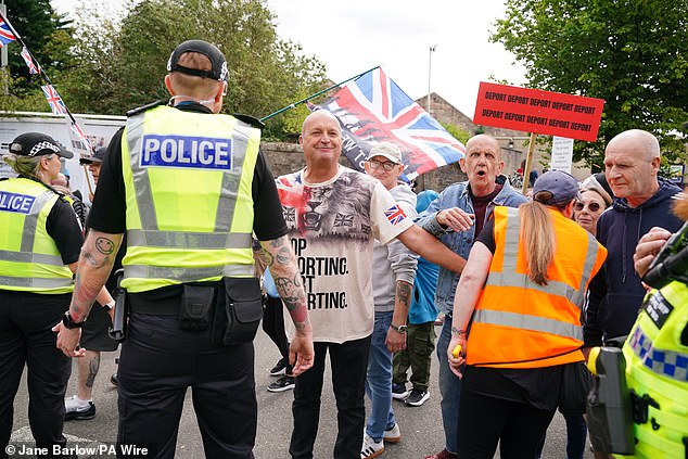 Police try to contain anti-immigration protests in Perth