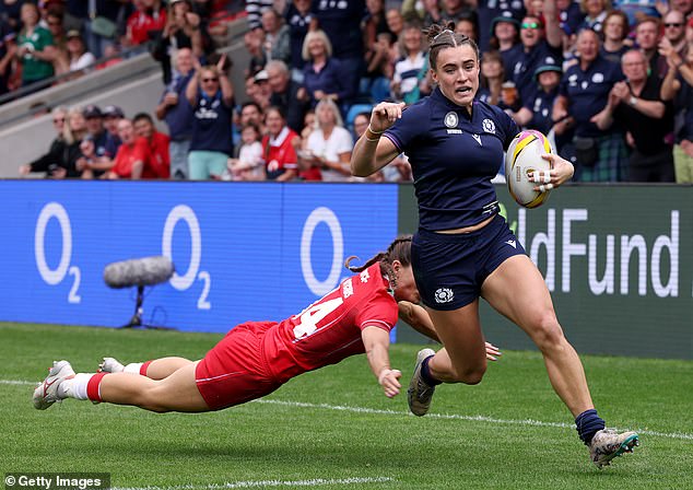 McGhie leaves Lisa Neumann trailing in her wake as she crosses for Scotland's opening try