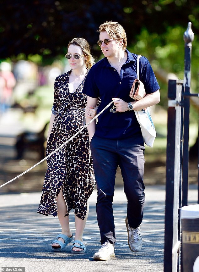 Her leopard print dress featured a tie waist which she knotted around the top of her bump yet chose comfort with her choice of sandal