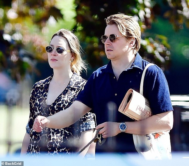 Saoirse Ronan appears to be taking to life as an expectant mum with aplomb as she enjoyed a dog walk with her husband Jack Lowden in London on Sunday, as they took their beloved terrier Fran for a sunshine stroll