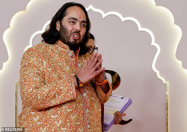 Vantara, was also one of the venues for Anant's pre-wedding celebrations last year, with the global celebrities who attended advised to don 'jungle fever' outfits when visiting. Pictured: Anant Ambani gestures on the day of his wedding with Radhika Merchant