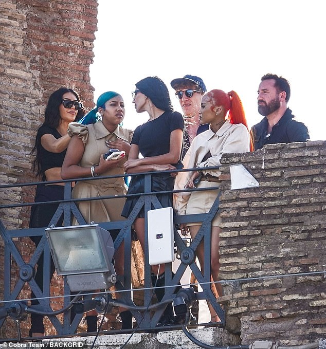 Kim appeared to have a large ensemble of both security and tour guides