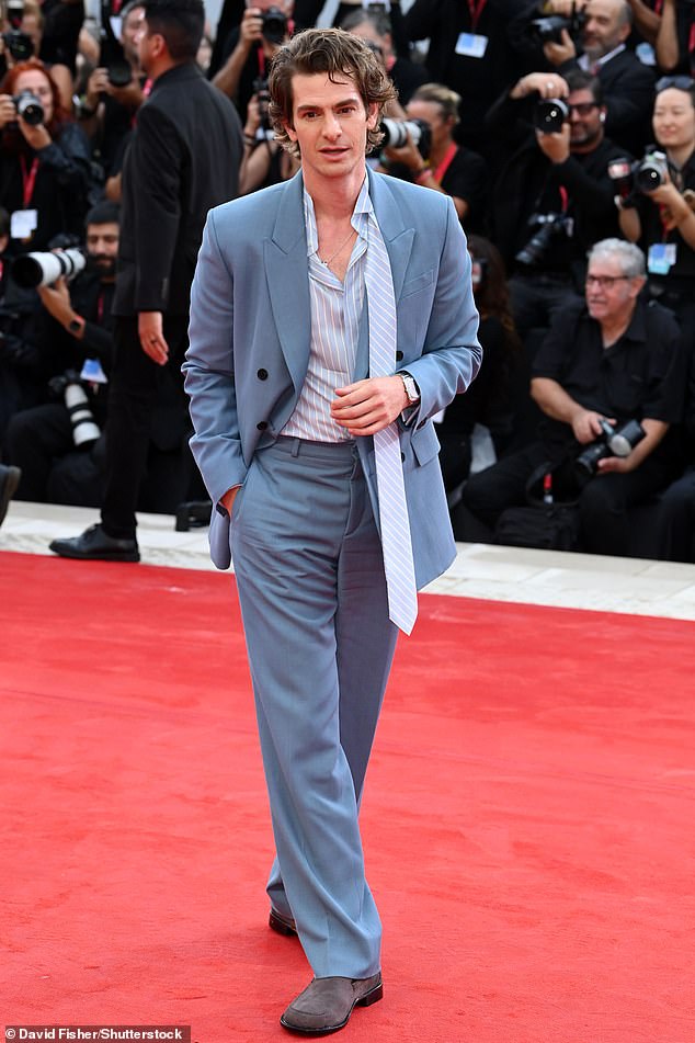 Andrew Garfield cut a typically cool figure in a blue suit at the event