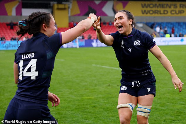 Rhona Lloyd and Emma Wassell perform a jig of joy after victory was secured