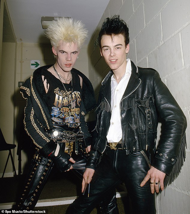 The sad news of his death was shared by bandmate Martin Degville in a Facebook tribute ( he is pictured left with bandmate Chris Kavanagh)