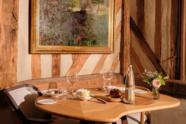 Alex Crétey Systermans A corner of the dining room at Ferme Saint Siméon.