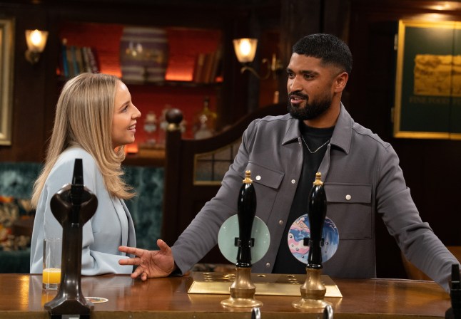 Belle speaks to Kammy at The Woolpack bar in Emmerdale